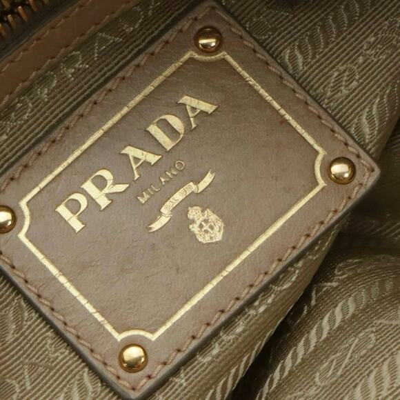 Authenticated Prada Vitello Daino Drawstring Leather Tote - Picture 7 of 10